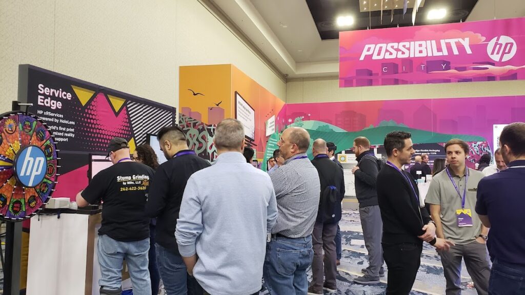 a group of people at a trade show