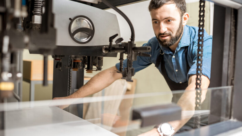 feeling a paper into the printing machine 2023 11 27 04 52 35 utc scaled