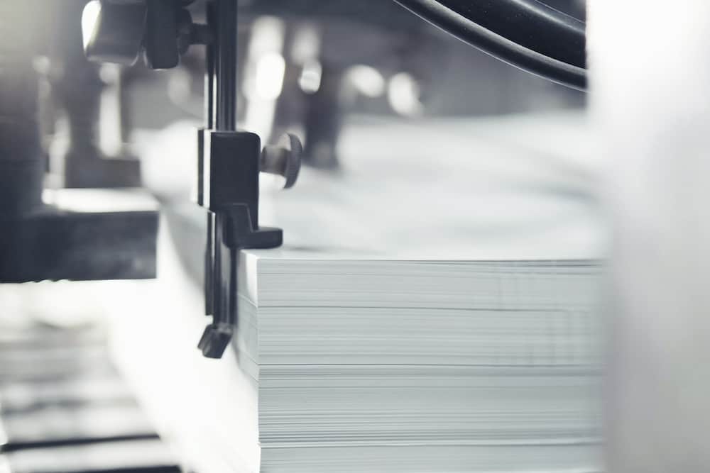 Calculating & Reducing Printing Cost Per Page for Business