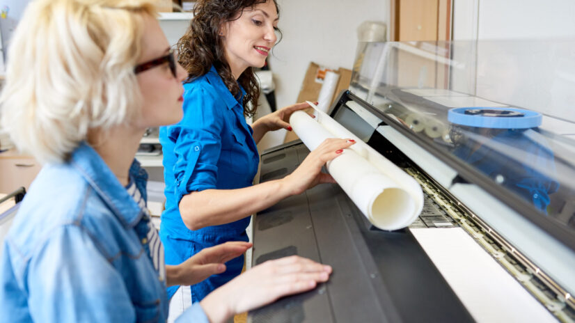 women changing paper in printing press 2023 11 27 05 31 07 utc scaled