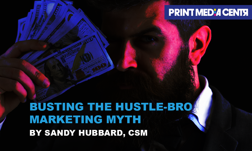 salesman with beard holding money