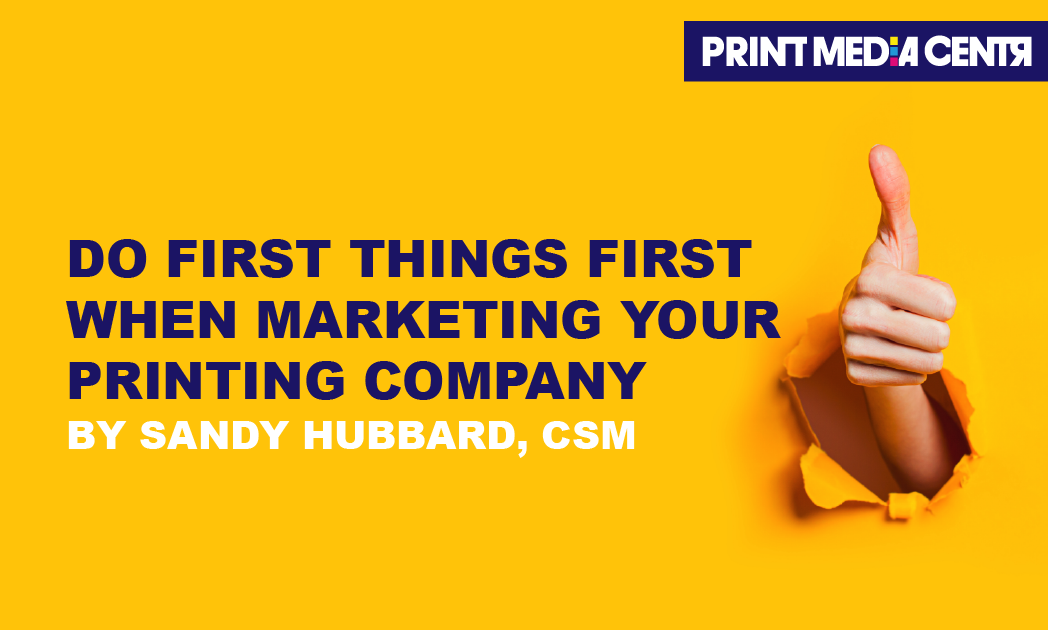 woman's hand thumbs up coming through a yellow background